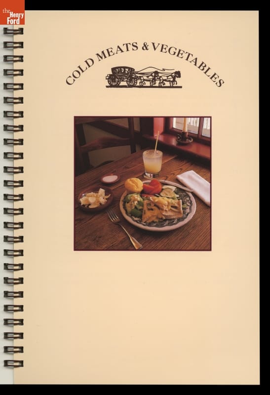 Eagle Tavern Cookbook, 1988 / Cold Meats & Vegetables Spiral-bound page with text and image of wooden table set with food and drink