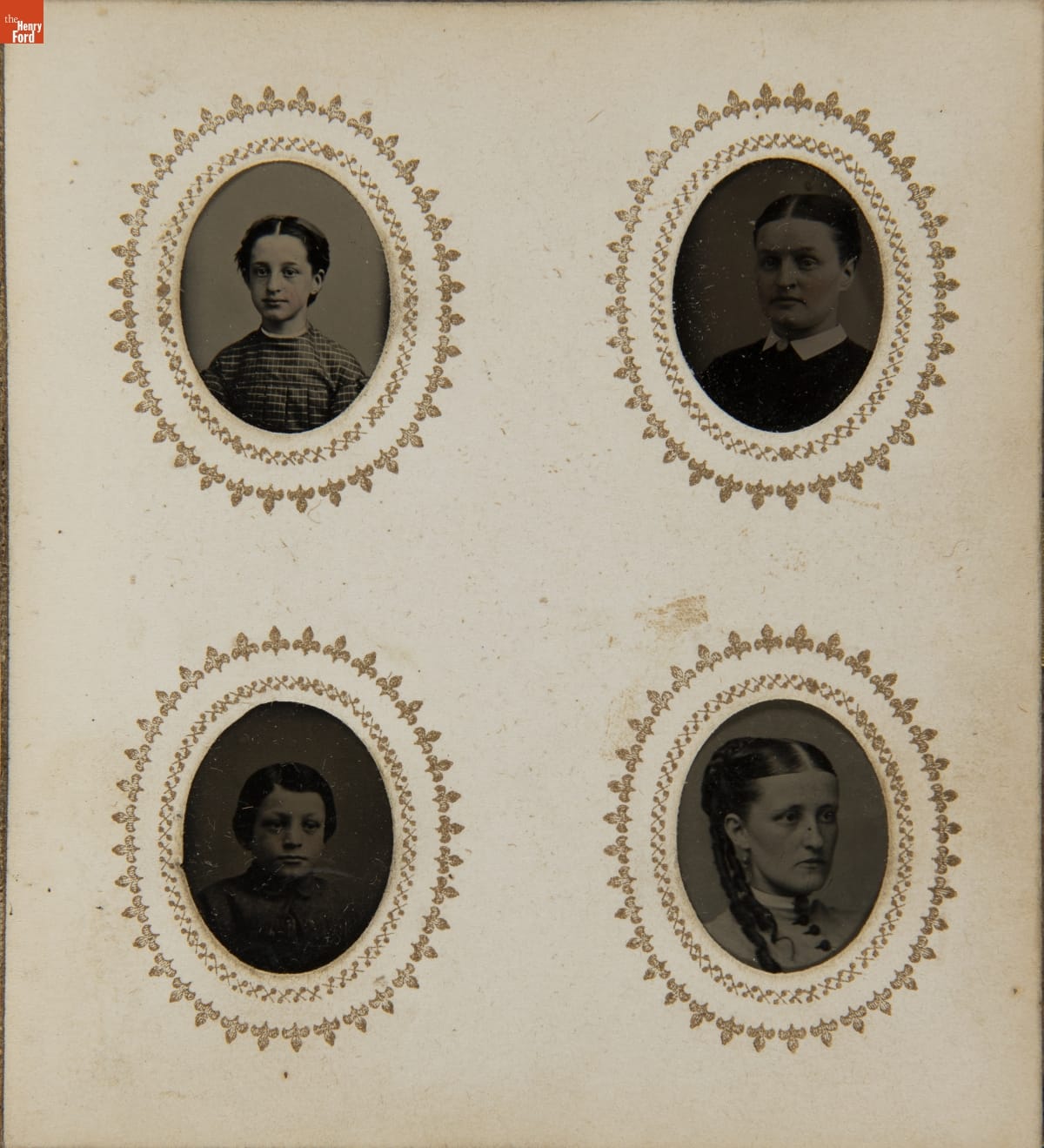 Photograph Album of Gem Tintypes, circa 1865 Page containing four oval head-and-shoulder portraits with decorative borders around each portrait