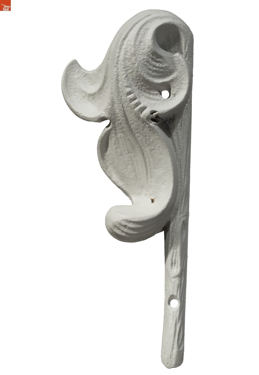 Architectural Ornament from the Detroit Central Market, 1860 White architectural element in the shape of a curved leaf and stem
