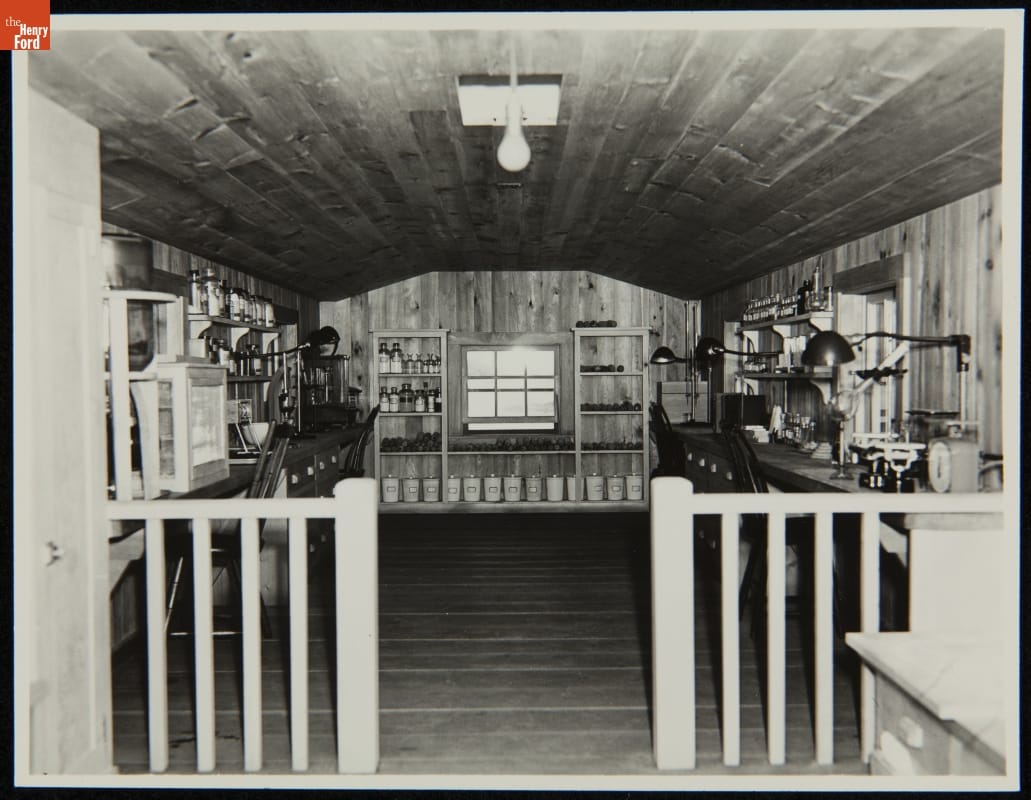 Interior of the Soybean Laboratory in Greenfield Village, Dearborn, Michigan, circa 1935 Wood-paneled room with walls lined with tables and equipment