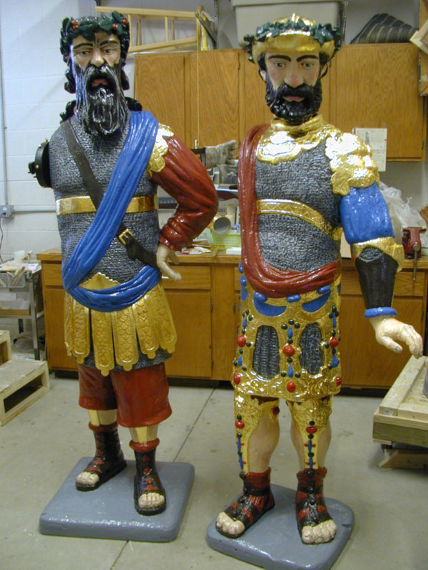 Newly restored Gog and Magog. Two colorful sculptures of bearded men wearing elaborate costumes