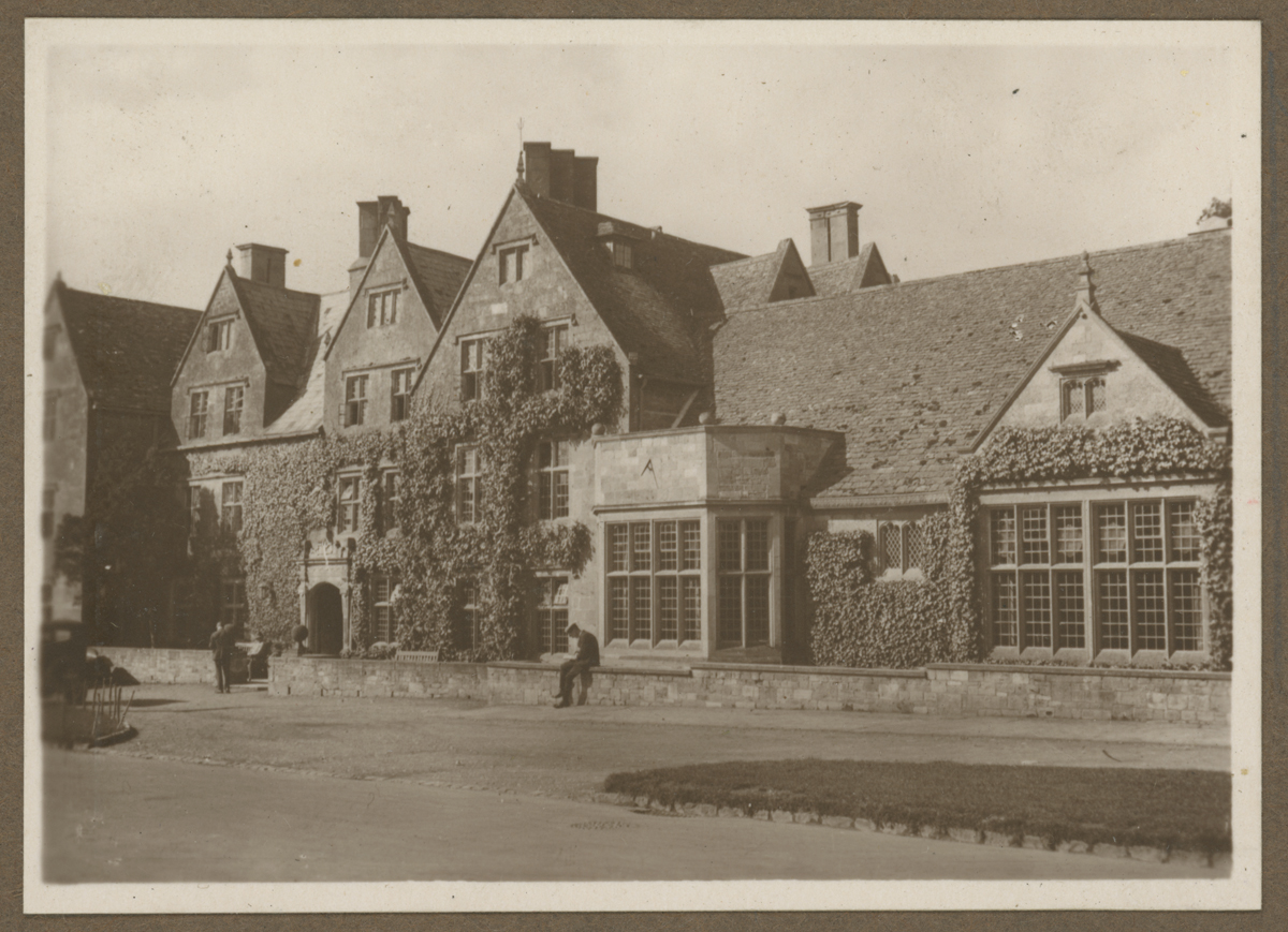Photograph Album, Henry and Clara Ford's Visit to the Cotswolds, October 1930 / page 6 Ivy-covered stone building; road in front