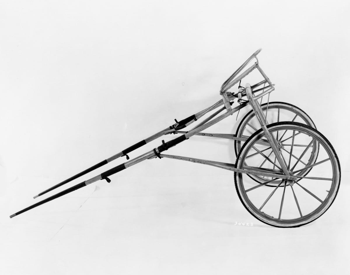 Sulky, 1892-1893 Minimal conveyance with two wheels, rudimentary seat, and two bars for attaching to a horse