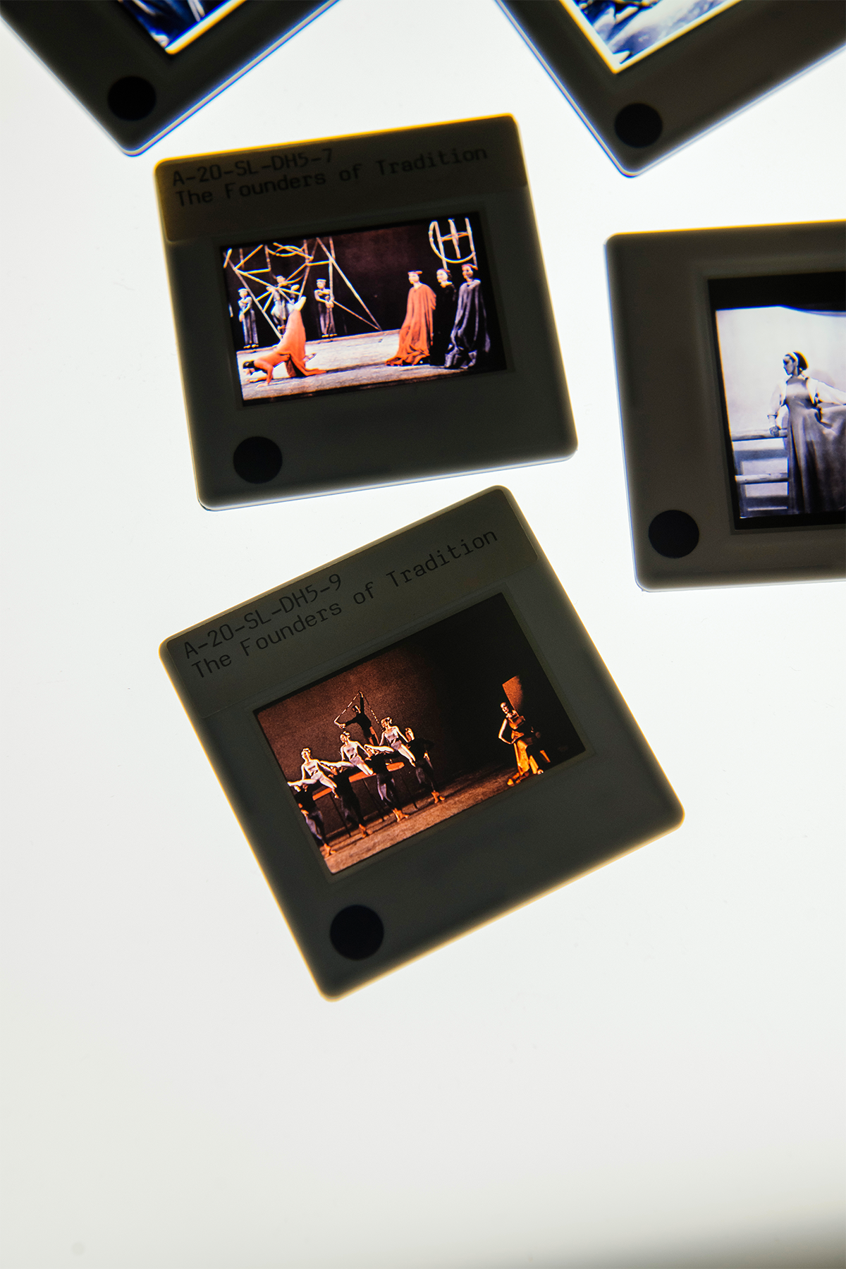 Slide images from performances of (clockwise from bottom) Acrobats of God (1960), Seraphic Dialogue (1955) and Frontier (1935). PHOTO BY EE BERGER