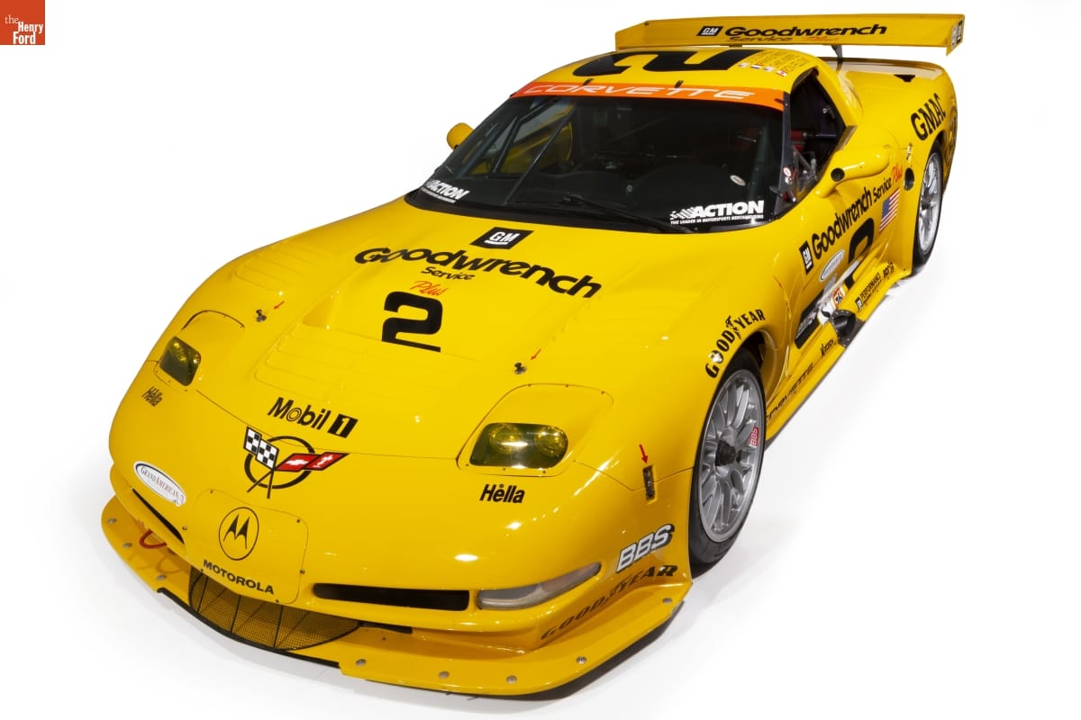 2001 C5-R Corvette. On Loan from General Motors Heritage Center. Low yellow race car with text and logos