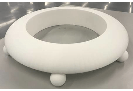 3D-printed lamp base in the process of being painted GIF rotating through several images of 3D-printed circular lamp base