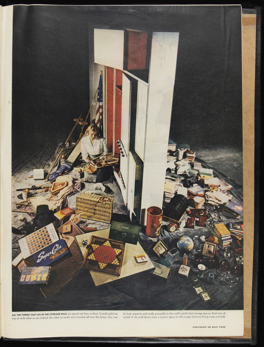 Life Magazine for January 22, 1945 / page 67 Image of woman sitting surrounded by random items next to a large, thin cabinet