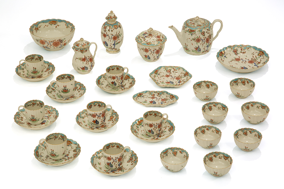 Tea Service, Made by Worcester Royal Porcelain Company, 1765-1770 Photo of extensive cream colored tea service with intricate multicolored flowers and birds; set contains cups and saucers, small bowls, teapot, and several other miscellaneous dishes