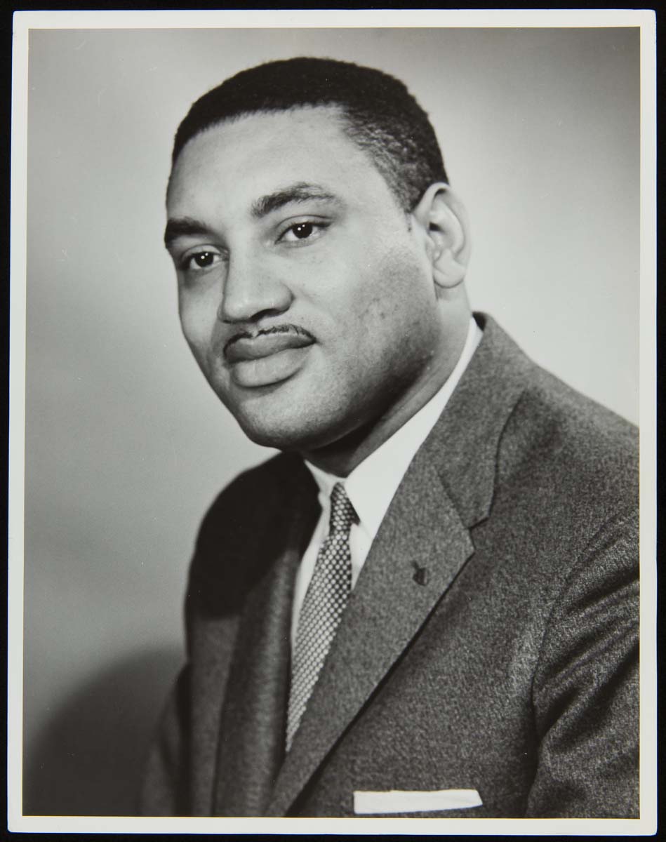 McKinley Thompson, Jr. Torso and head of an African American man wearing a suit