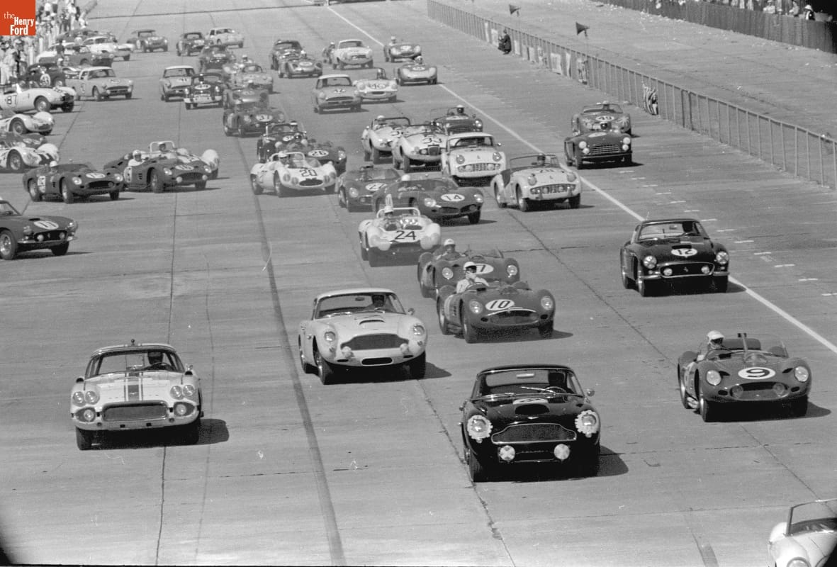 1961 12 Hours of Sebring Many race cars drive on a track