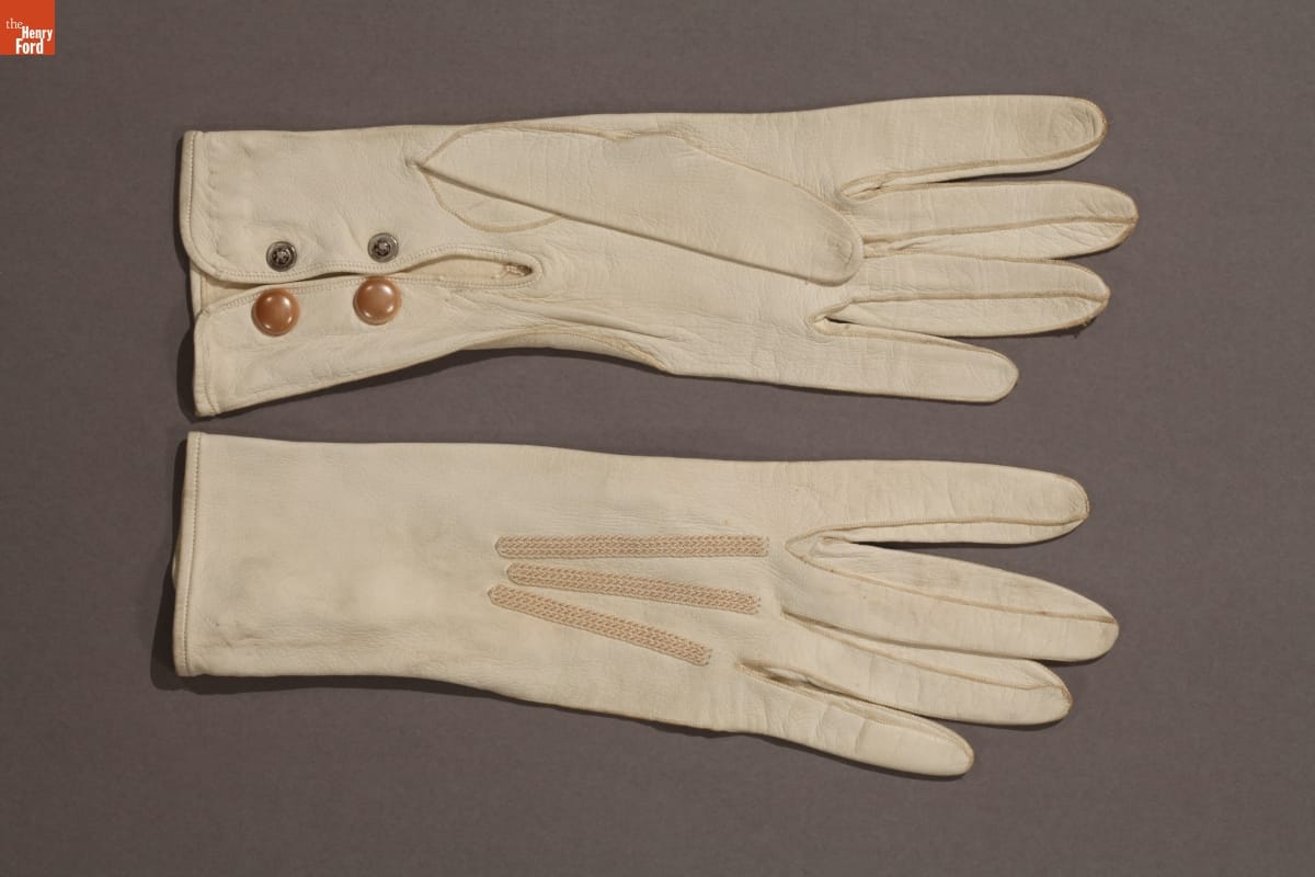 Ladies Leather Gloves, 1920-1930 Pair of white gloves with elastic strips on top and buttons on underside
