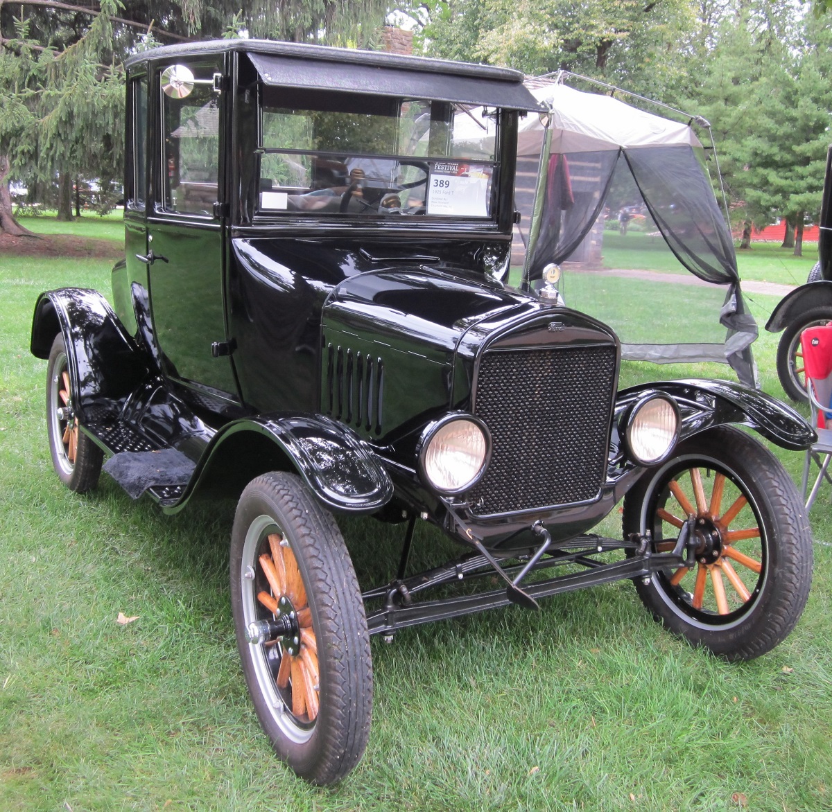 Mose Nowland's 1925 Model T Black car parked on grass