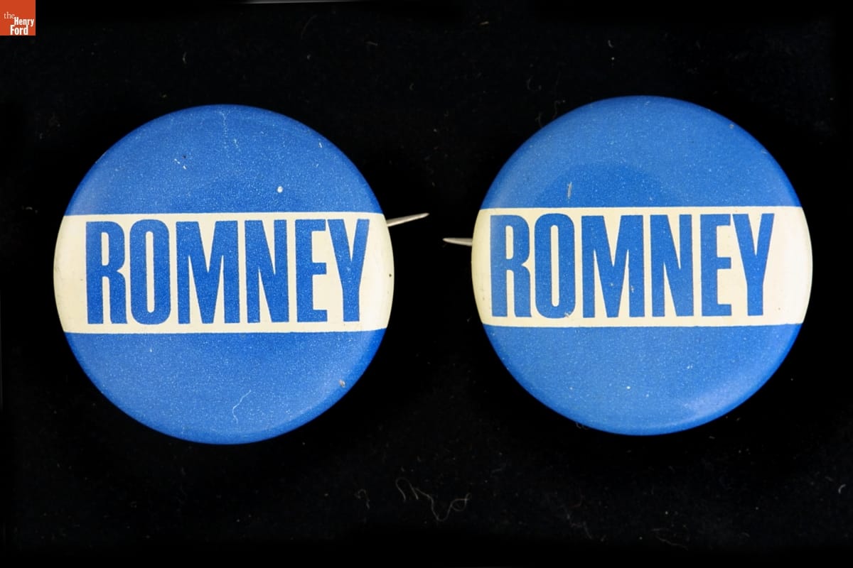 "Romney" Buttons, 1968 Two circular blue buttons with wide white band containing blue text “ROMNEY” across center