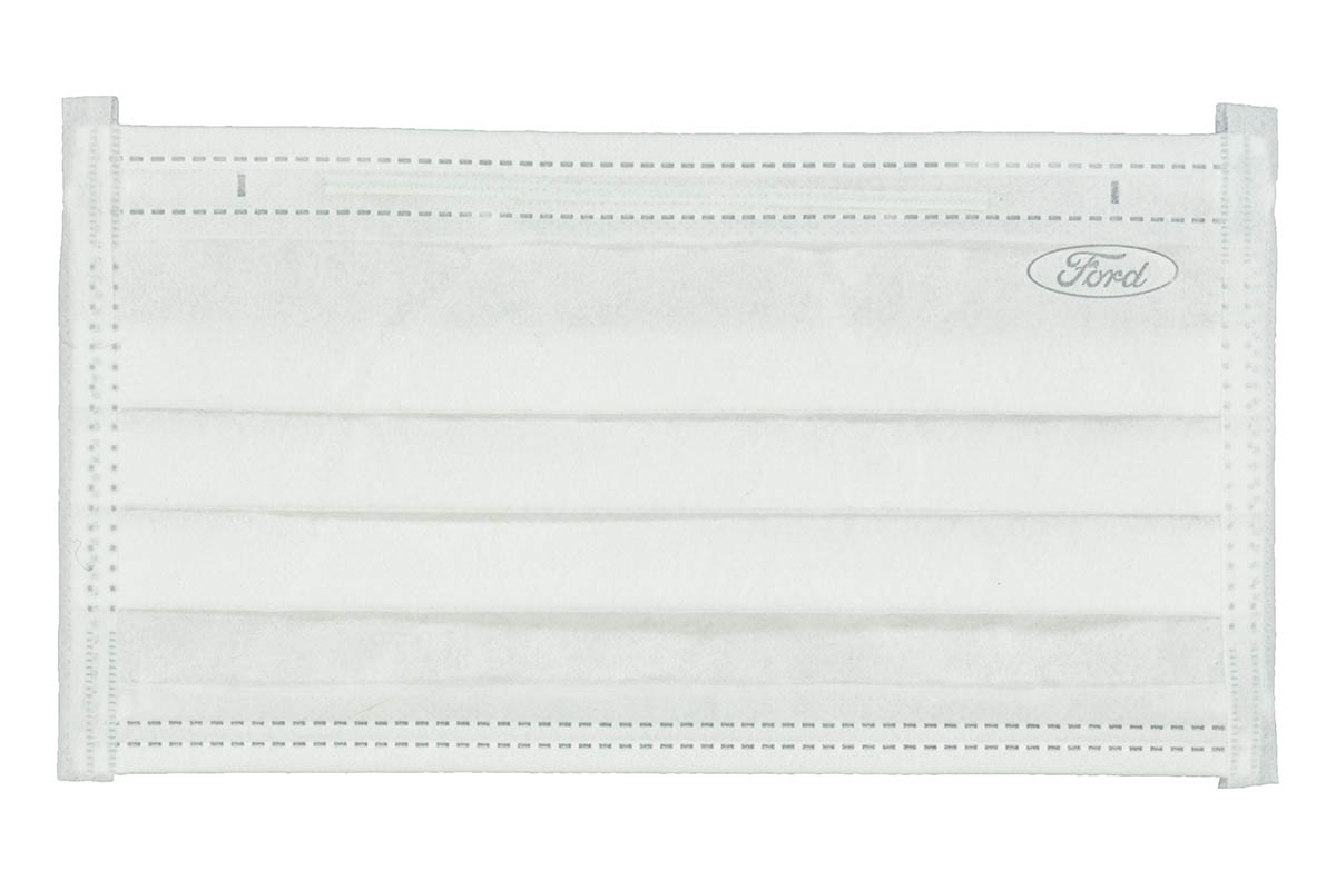 White surgical face mask with subtle "Ford" oval logo in upper right 