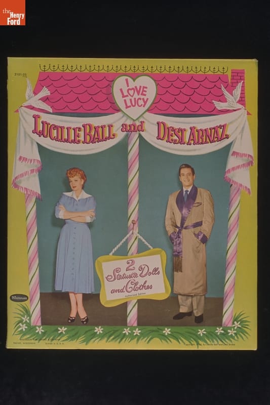 "I Love Lucy" Cut-Out Dolls, 1953 Sheet with images of man in smoking jacket or long robe and woman in dress standing in stylized house or structure; also contains text