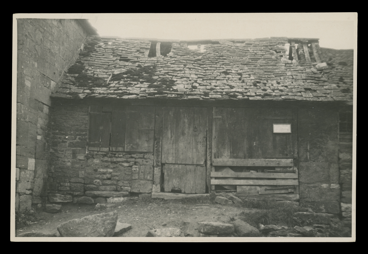 Cotswold Forge at Original Site, Snowshill, England, circa 1930 Run-down looking stone and wood building