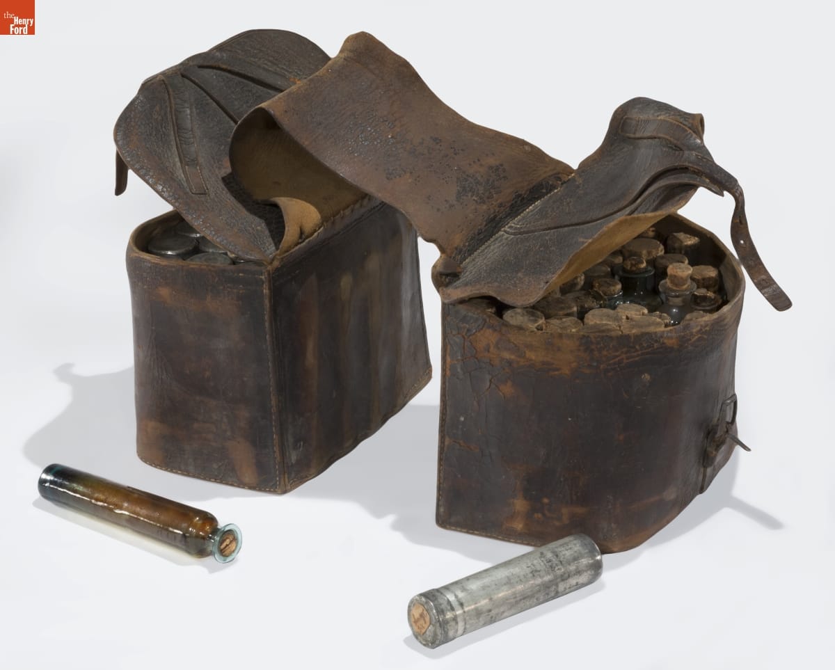 Physician's Saddlebag, 1850-1870 Black leather saddlebag filled with vials