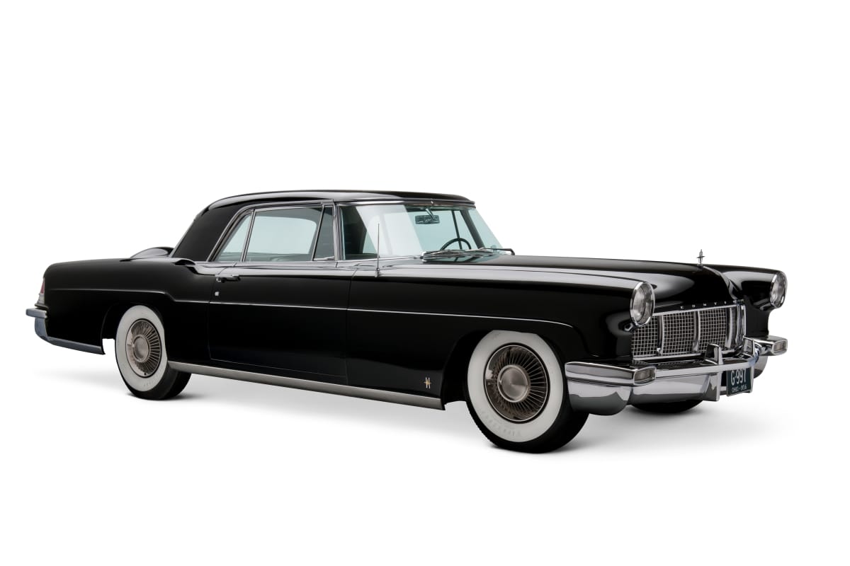 1956 Continental Mark II Sedan Black car with long hood and whitewall tires