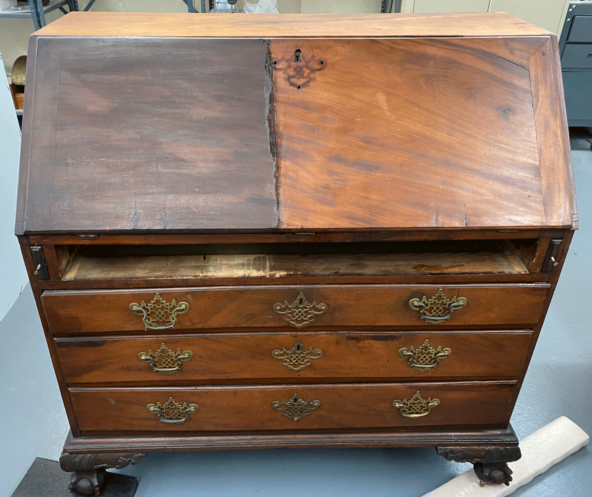 During-shellac-removal View during shellac removal with the right side of the drop-front stripped.