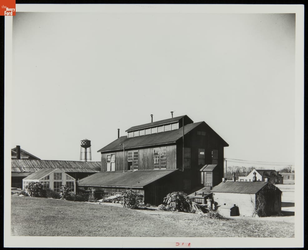 Soybean Laboratory in Greenfield Village, 1930 Large wooden building with greenhouse and other buildings nearby