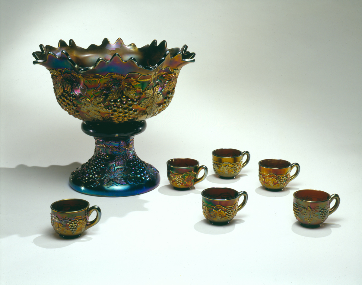 Punch Service Set, 1910-1925 Elaborate blue and gold iridescent punchbowl and 6 cups