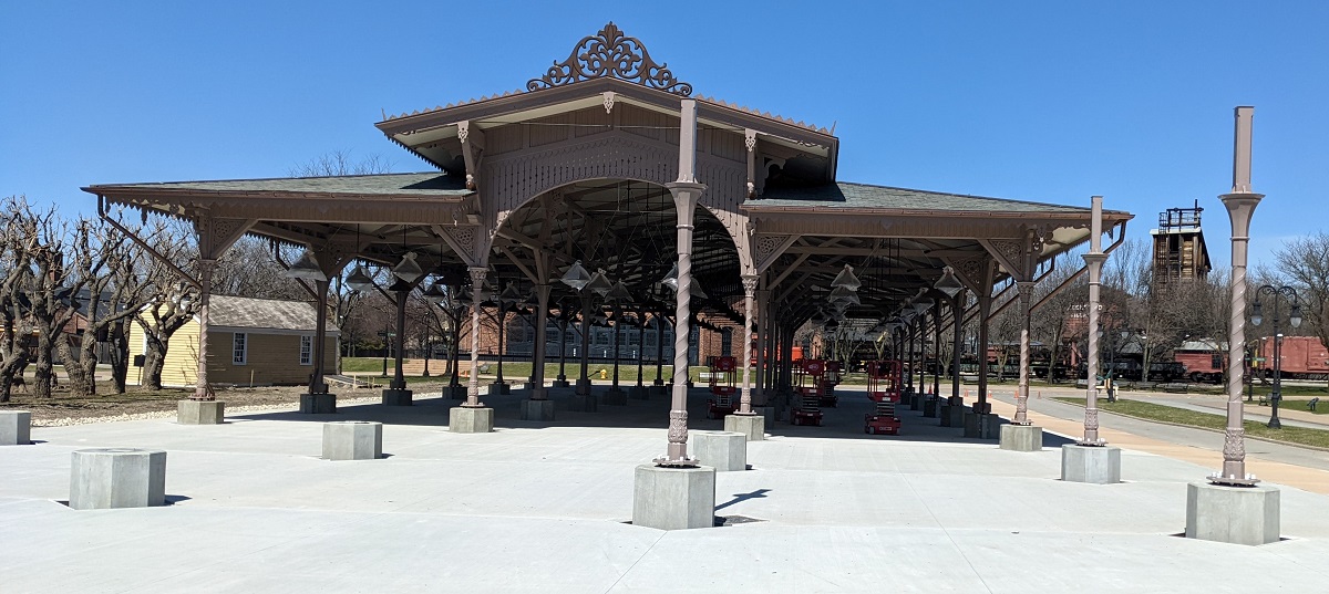 What was originally the west entrance to Detroit Central Market Large, open-sided building with structural columns (including columns completely outside the structure, not supporting anything)