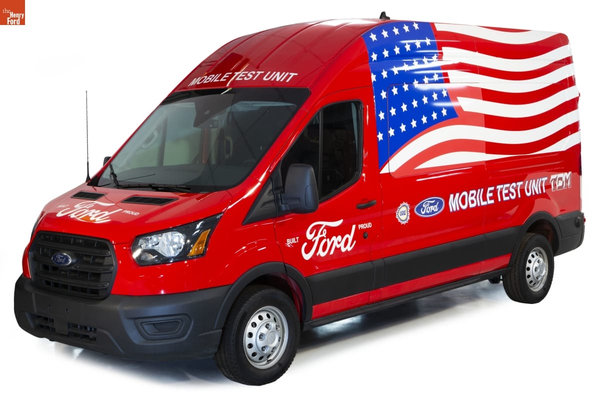 Ford Transit Van, Modified for Use as a COVID-19 Mobile Testing Facility, 2020 Red van with large American flag painted on side and text on side and front