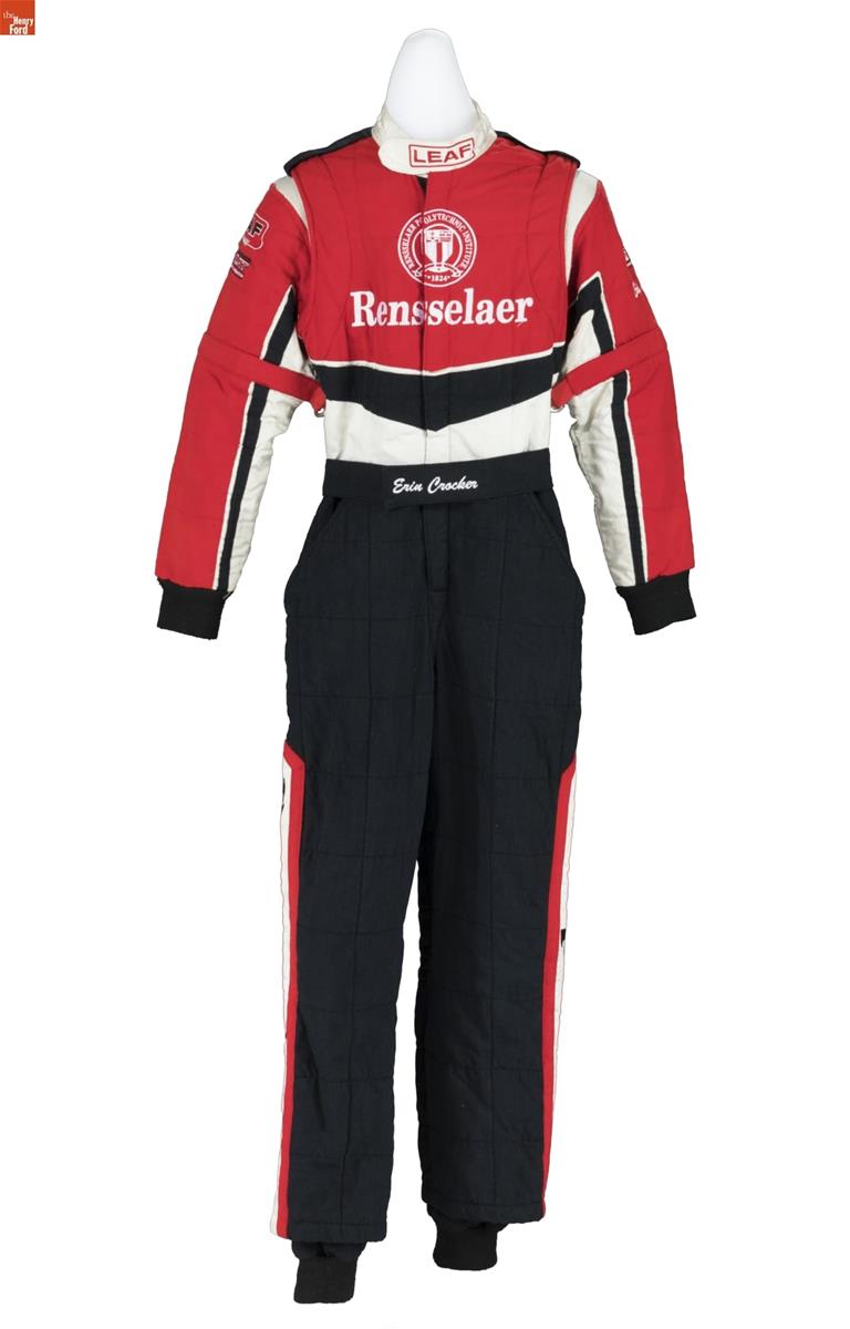 Racing Suit Worn by Erin Crocker While Competing in the 2003 Season of World of Outlaws Sprint Car Series Jumpsuit with black pants with red trim on sides and red, black, and white bodice and sleeves containing text