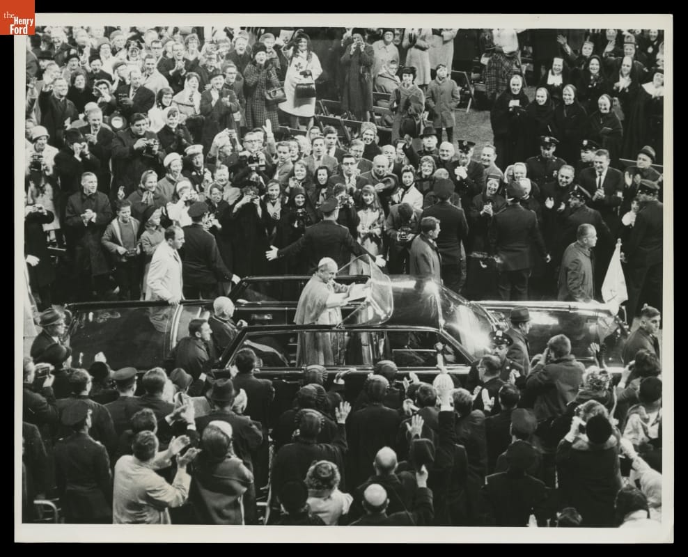 Pope Paul VI Pictured Visiting New York in 1965, Press Release on His 1968 Visit to Colombia Man in robe and skullcap stands in a limousine, waving, in a dense crowd of people