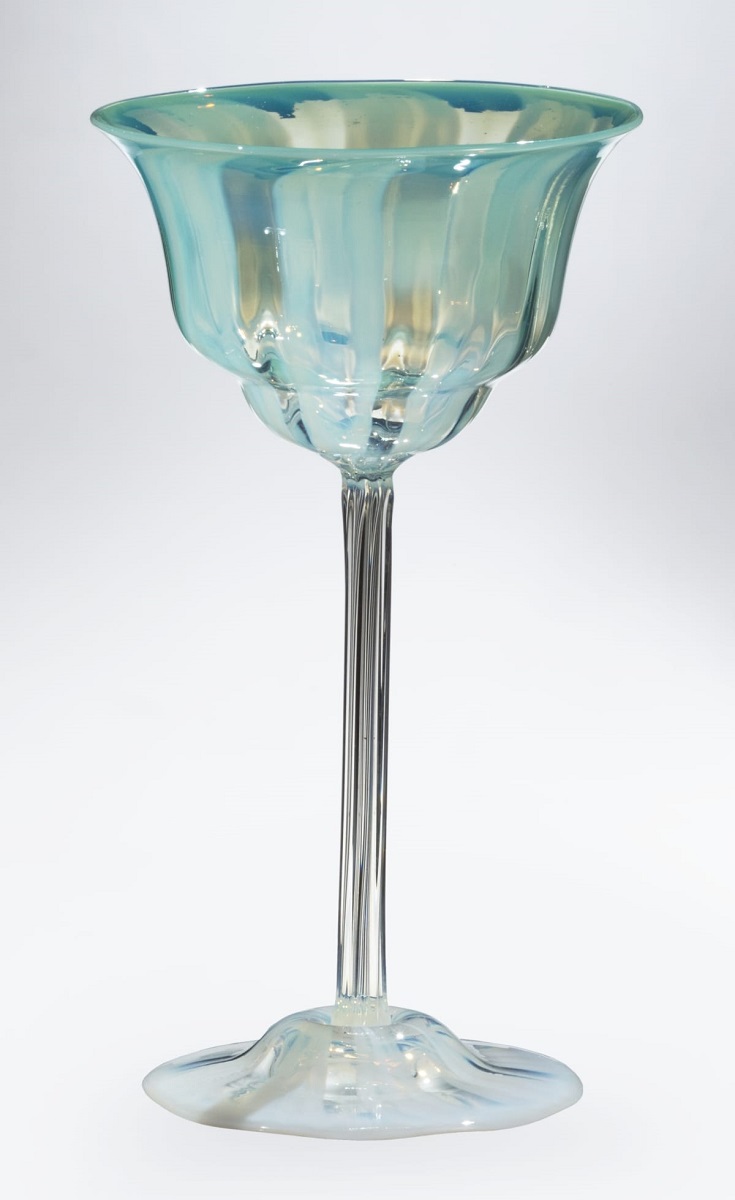 Favrile Wine Glass, 1918-1924 Wine glass with clear base and long stem topped by small body of sea green with striped pattern