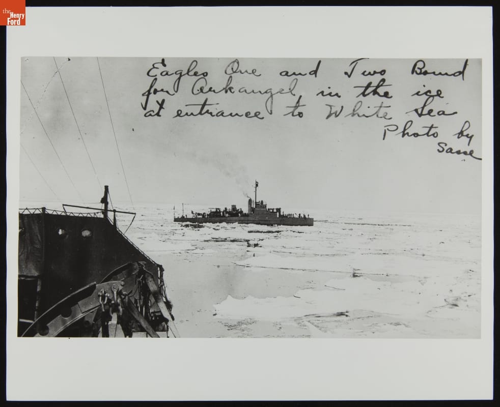 U.S.S. Eagles 1 and 2 in Ice at Entrance to White Sea, Bound for Arkhangelsk, 1919 Boat on ice-packed body of water, taken from another ship partially visible in foreground