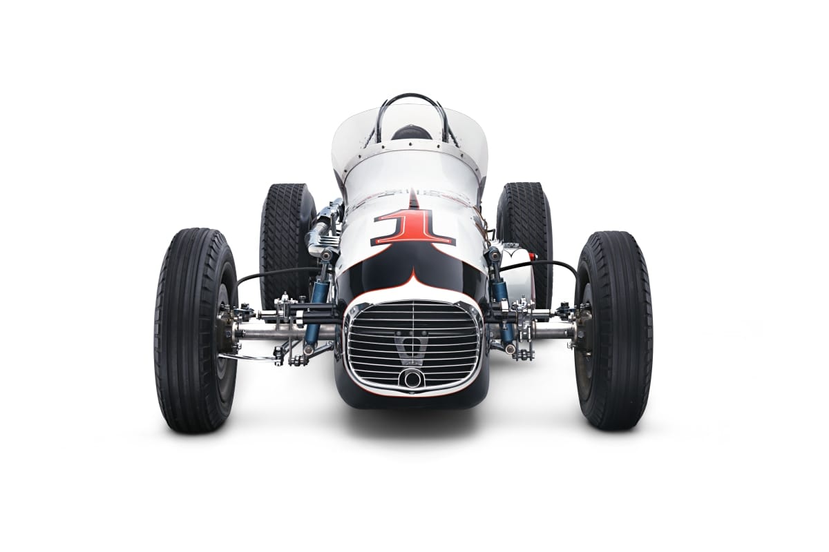 1960 Meskowski Race Car Head-on view of narrow black-and-white race car with open cockpit and large wide-set tires