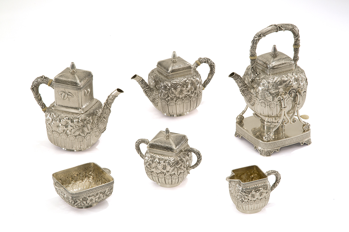 Tea and Coffee Service, Made by Gorham Manufacturing Company, 1883-1884 Silver pieces, including four pitchers of different shapes and sizes and two other containers, one with a lid, all elaborately decorated with bamboo, florals, and other decorative elements