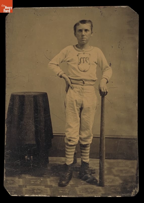 Portrait of a Baseball Player, circa 1880 Black-and-white image of a man in a baseball uniform, holding a bat