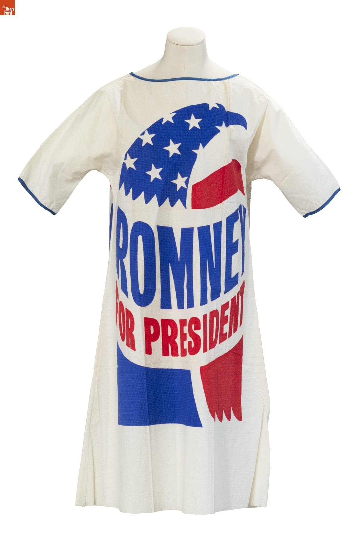 "Romney for President" Paper Dress, 1968 White dress with a large stylistic eagle in blue, red, and white stars, with text “Romney for President” forming part of the body