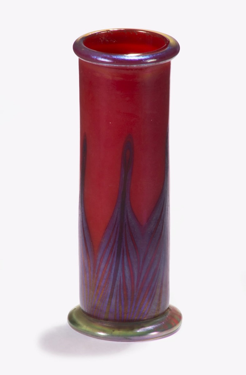 Favrile Vase, 1901-1915 Thin red glass vase with "peacock feather" pattern in muted blues