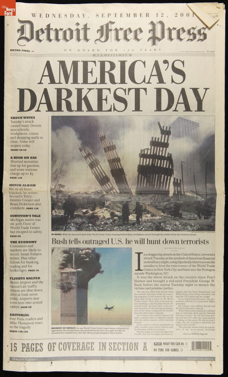 Detroit Free Press, Section A, September 12, 2001, "America's Darkest Day" Newspaper front page with headline "America's Darkest Day," text, and images of wreckage and airplane near a smoking building