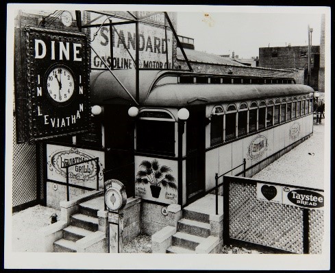 Leviathan Grill, Newark, New Jersey, circa 1930 Long low building with windows all along the side; clock hanging in front with text "Dine in Leviathan"