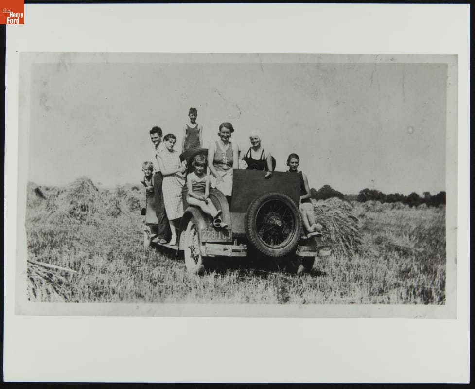 Edward "Buster" Pussler, Malcolm Morris, Rosalie Pussler, Earl Stone, Wilhelmina Morris, Rose Stone, Helen Morris, and Mary Ruth Stone Woodburn Posing on a Truck, 1934 Group of about seven people in and on a truck