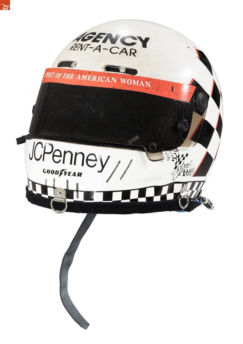 Racing Helmet Worn by Lyn St. James While Competing at the 1992 Indianapolis 500 White and black helmet with dark visor and red trim; also contains text