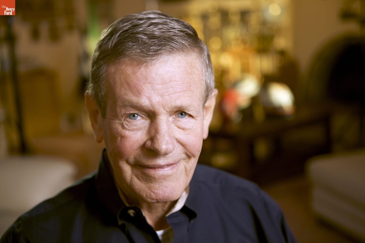 Bobby Unser during an oral history interview with The Henry Ford, January 7, 2009 Close-up of man's head and shoulders, wearing black shirt and smiling at camera