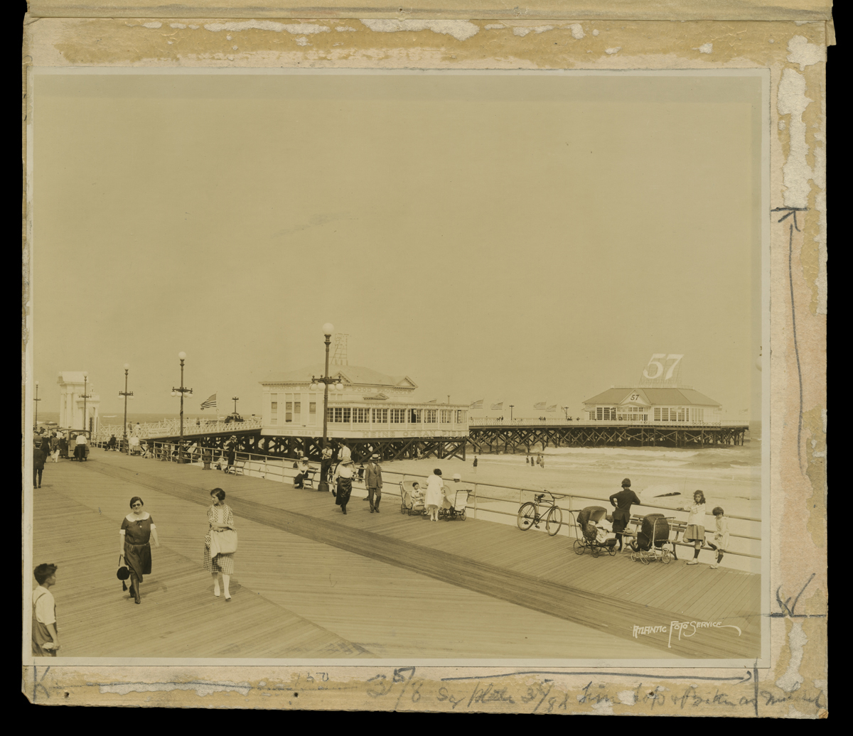 Advertising Process Photograph Showing Heinz Ocean Pier, Atlantic City, New Jersey, September 1923 Black-and-white photo of people walking along a pier