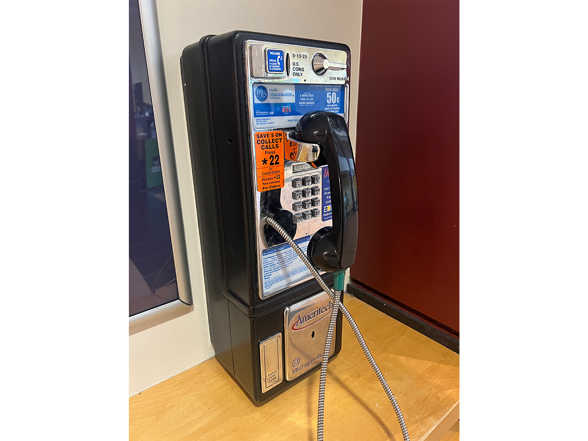 A functioning pay phone can still be found — and used! -- in the Welcome Center at Henry Ford Museum of American Innovation. / Photo by Rachel Yerke-Osgood 
