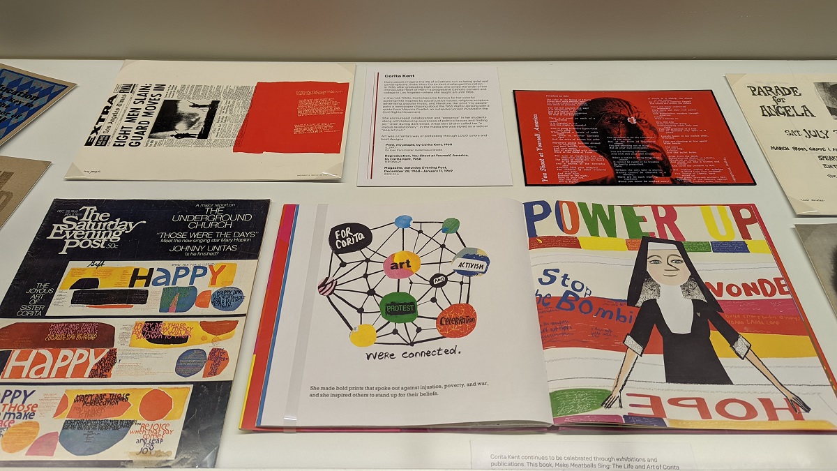 Part of the Quiet & Loud Protest pop-up exhibit in Henry Ford Museum of American Innovation Several flat, colorful paper items--books, prints, and magazines