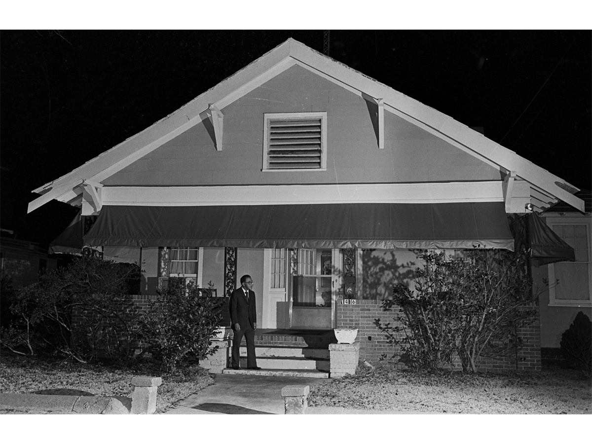 Dr. Sullivan Jackson on the front steps of the Jackson Home ca.1999. The house reflects changes made in the late 1960s and 1970s
