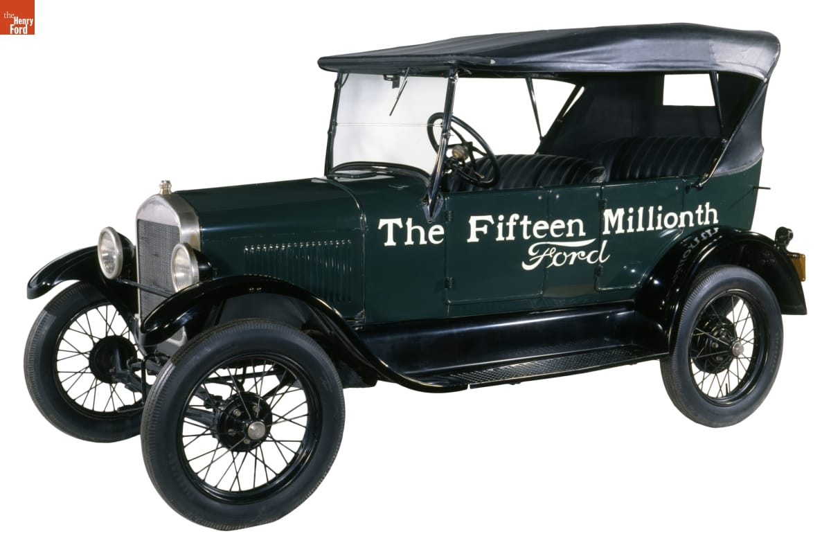 1927 Ford Model T Touring Car, The Fifteen-Millionth Ford Green car with black top, with text on side:
