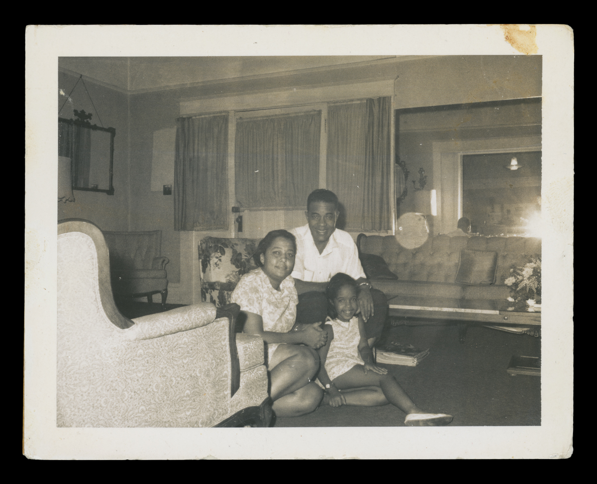 Dr. Sullivan, Richie Jean, and Jawana Jackson in their living room, 1960s.