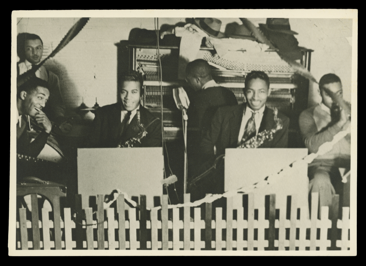 Sullivan Jackson with His Band, Date Unknown. Sullivan Jackson is seated second from the left holding his saxophone